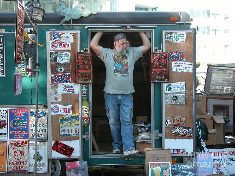 Sign Seller Photograph by Jim Goodman Sign Seller Photograph by Jim Goodman