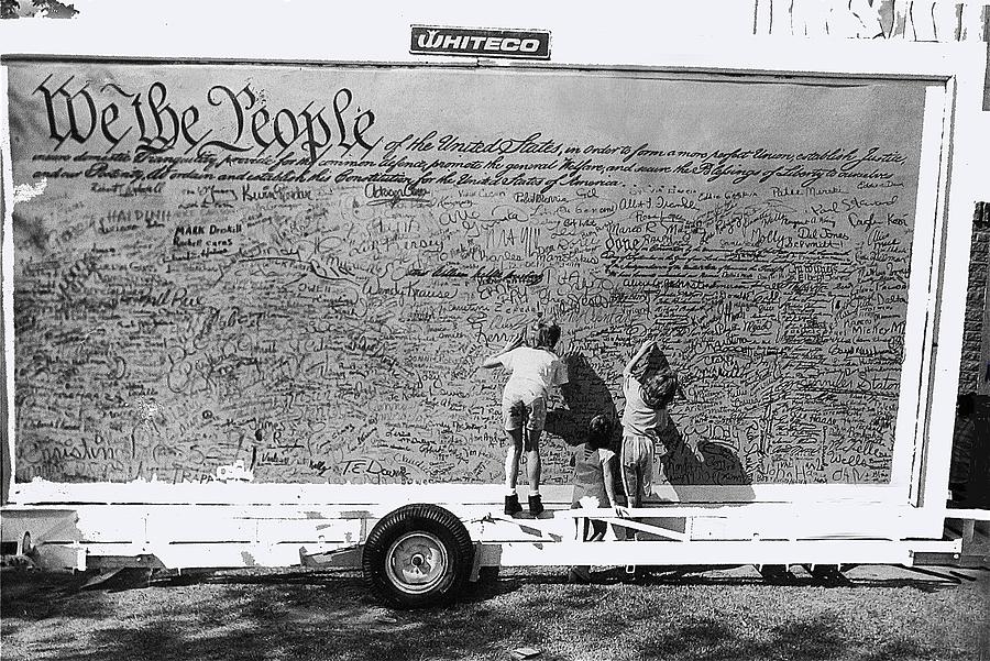 Signing names on billboard Bicentennial of the Constitution Tucson AZ 1987 Photograph by David Lee Guss