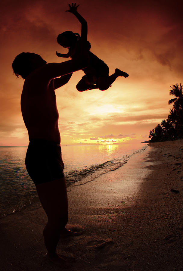 Silhouette Family Of Child Hold On Father Hand Photograph by Anek Suwannaphoom