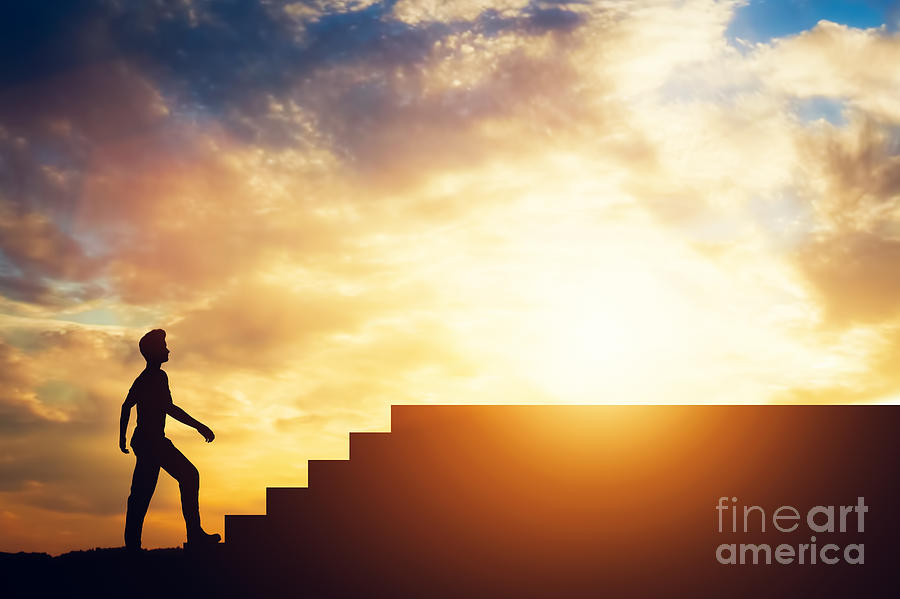 Silhouette of a man standing in front of stairs. Photograph by Michal Bednarek
