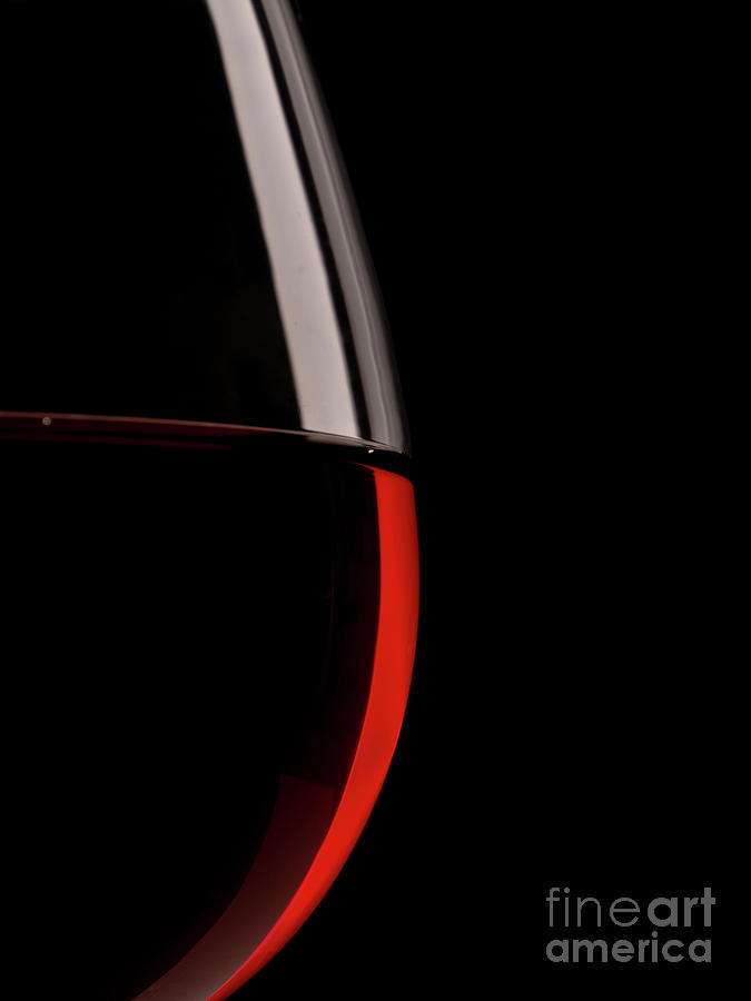 Silhouette of a red wine glass Photograph by Andreas Berheide
