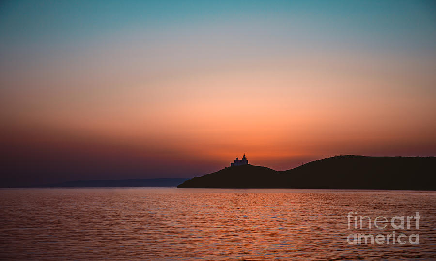 Silhouette of lighthouse Photograph by Anna Om