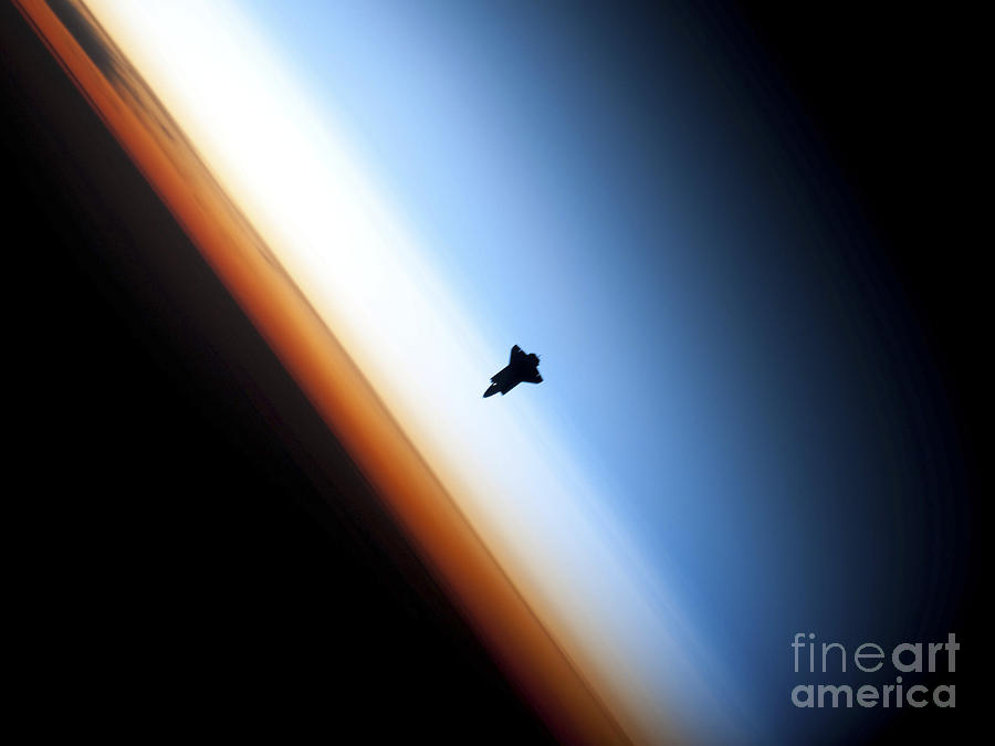 Space Photograph - Silhouette Of Space Shuttle Endeavour by Stocktrek Images