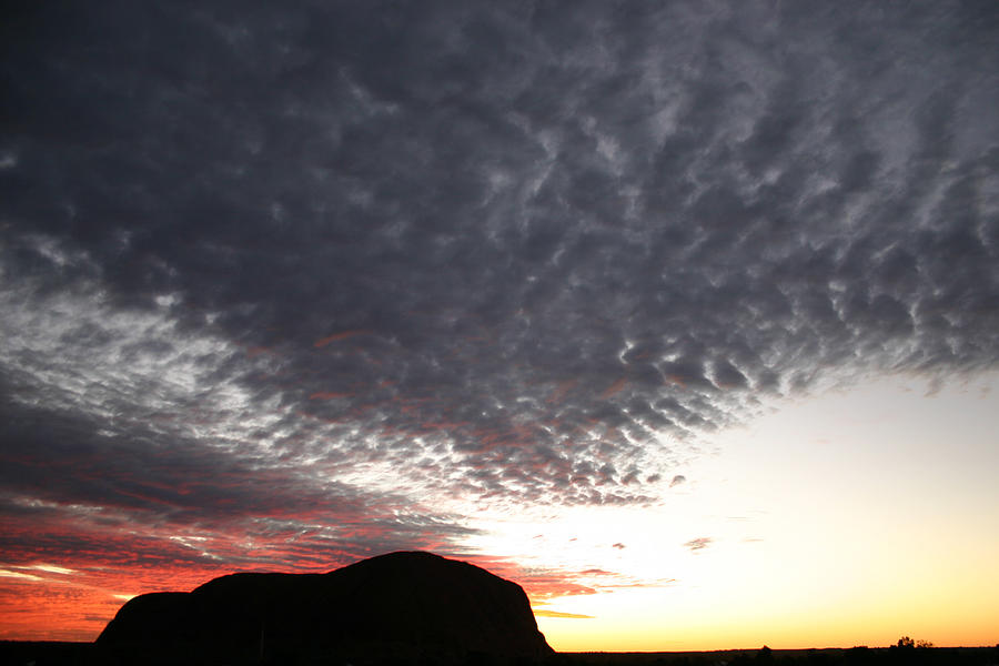 Silhouette of Uluru at sunset by Keiran Lusk Silhouette of Uluru at sunset by Keiran Lusk