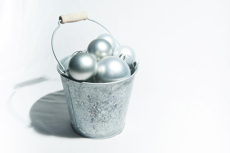 Silver Baubles in a Bucket Photograph by Helen Jackson