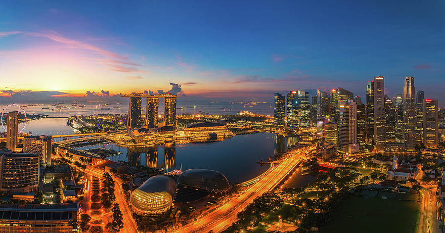 Singapore city and sunrise Photograph by Anek Suwannaphoom