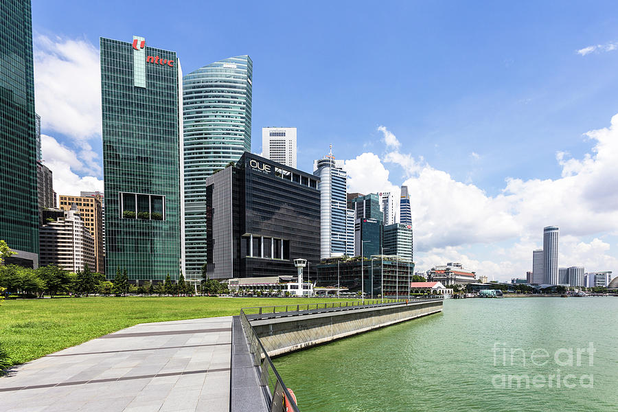 Singapore financial district skyline on a sunny day. Photograph by Didier Marti