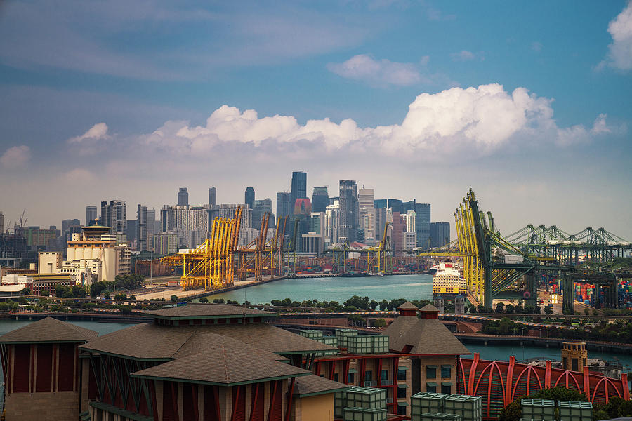  Singapore harbor with Singapore city background Photograph by Anek Suwannaphoom