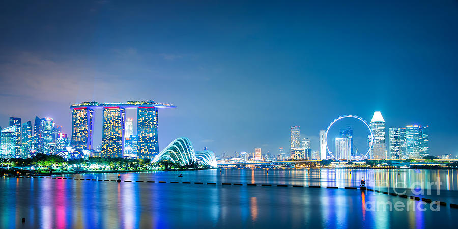 Singapore skyline panorama at night Photograph by Delphimages Photo Creations