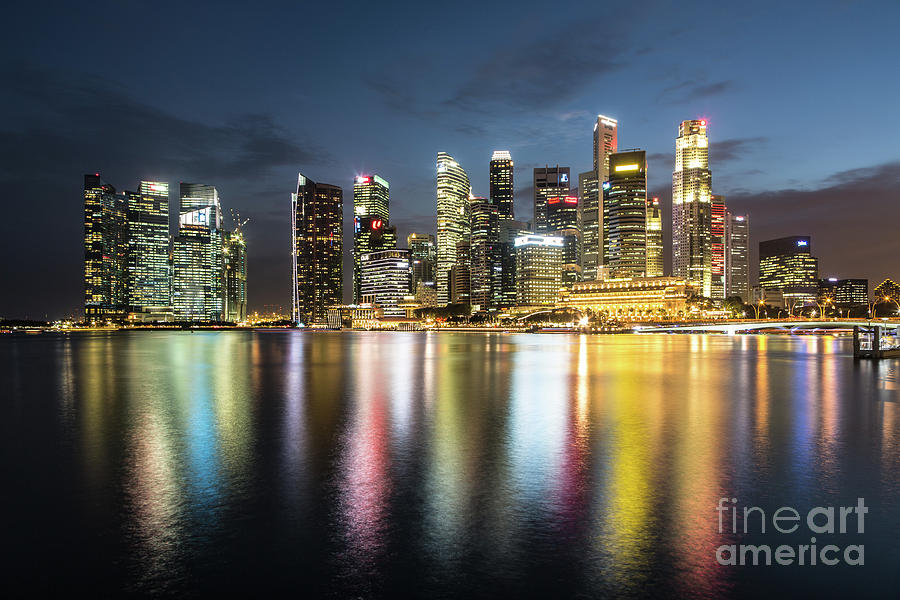 Singapore skyline night Photograph by Didier Marti