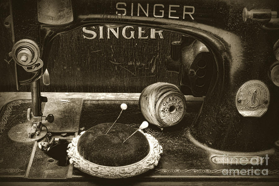 Singer Sewing Machine and a Victorian Pin Cushion Photograph by Paul Ward