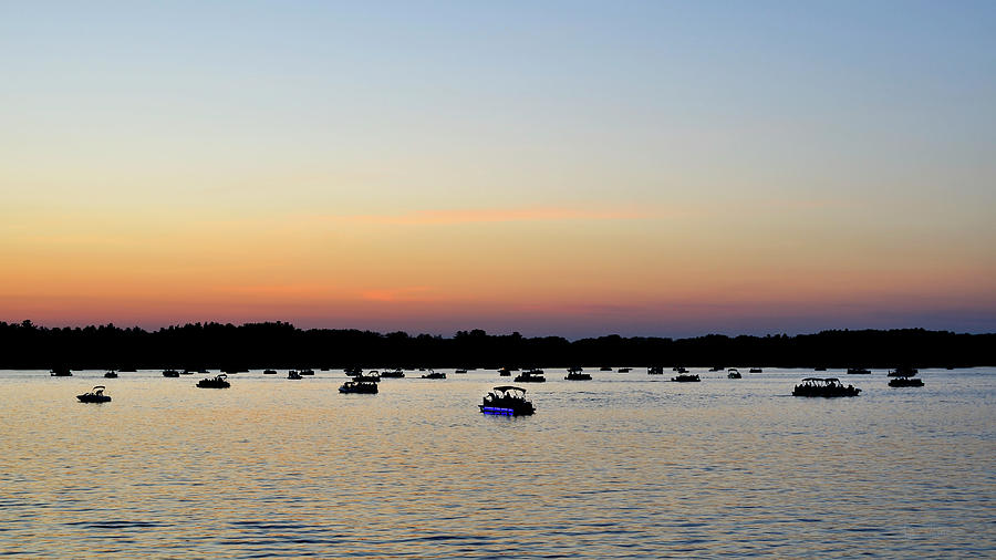 Single Blue Boat Webster Lake Sunset Photograph by Luke Moore