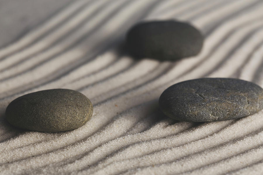 Single Meditation Stones on Flowing Sand Color Photograph by Andrew Pacheco