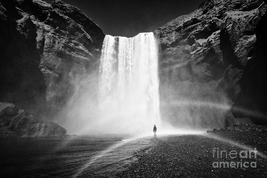 Waterfall Photograph - Single Tourist At Skogafoss Waterfall In Iceland by Joe Fox