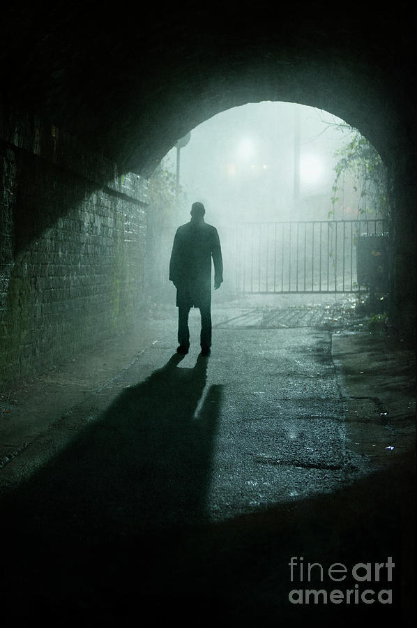 Sinister Man In Silhouette In A Tunnel On A Foggy Night Photograph by Lee Avison