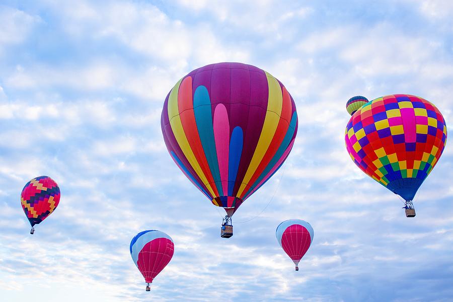 Six balloons in the air Photograph by Lynn Hopwood