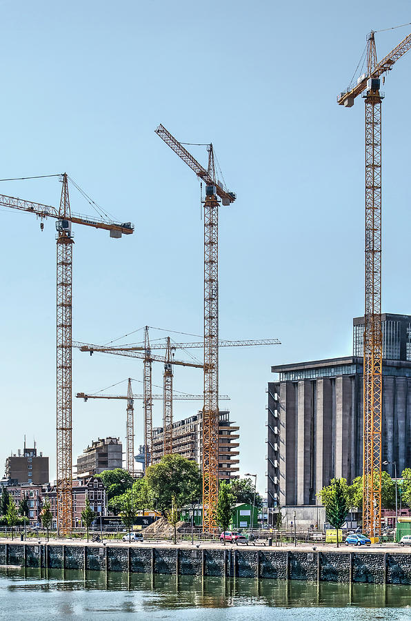 Six construction cranes Photograph by Frans Blok