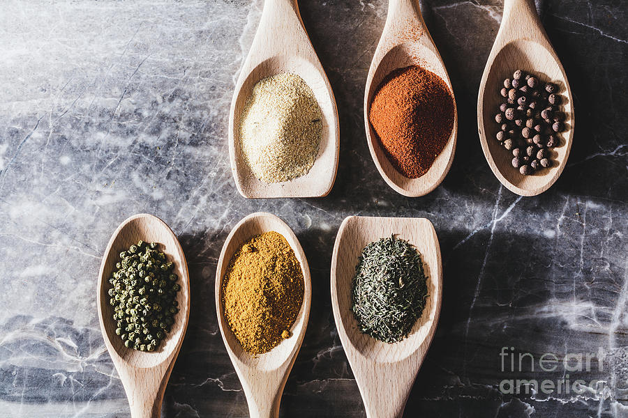 Six wooden spoons with colorful spices Photograph by Michal Bednarek