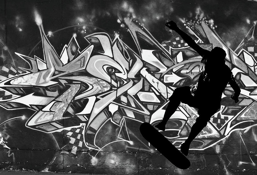 Skateboarder on Graffitti Photograph by Dawn OConnor