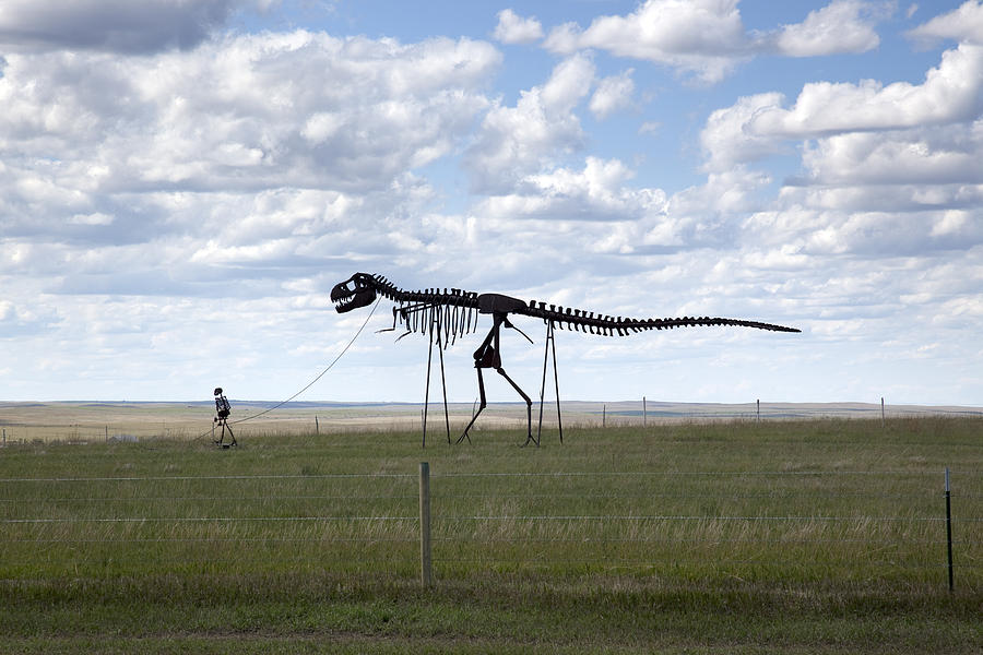 Skeleton man walking skeleton dinosaur, rural South Dakota Photograph by Carol M Highsmith