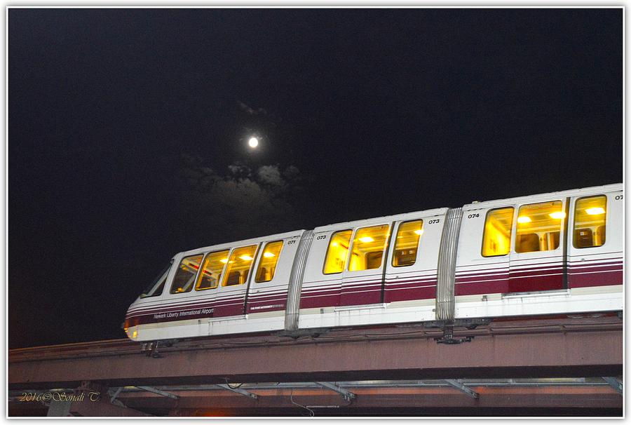 Sky Train on a lunar night Photograph by Sonali Gangane