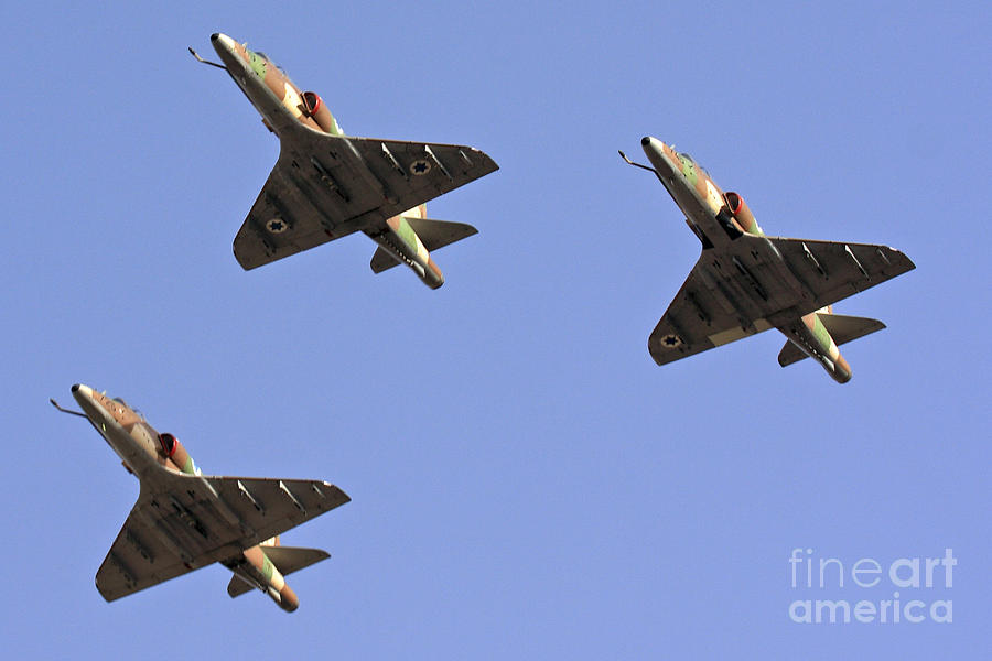 Skyhawk fighter jet in formation  Photograph by Nir Ben-Yosef