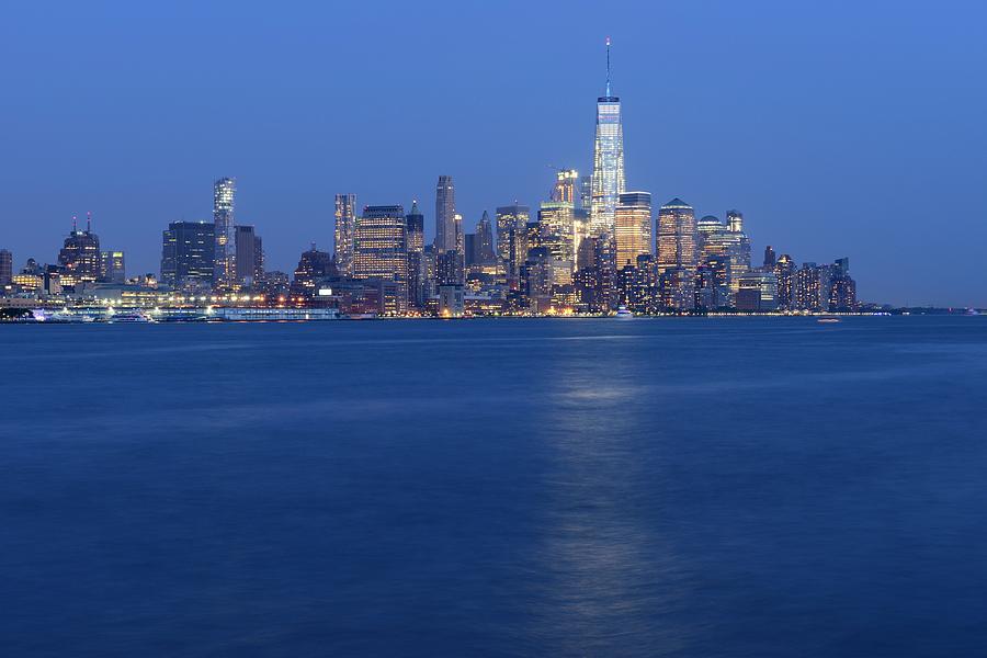 Skyline Lower Manhattan in the evening seen from New Jersey Photograph by Merijn Van der Vliet