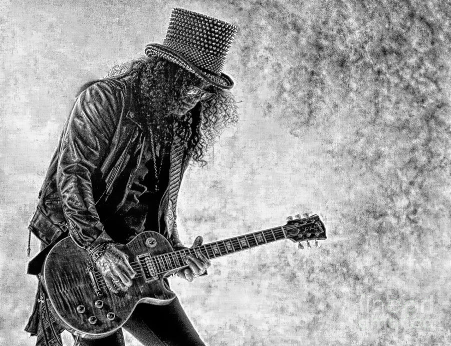 Former Guns N' Roses guitarist Slash signs copies of his autobiography ' Slash' at Waterstone's in Piccadilly, London Stock Photo - Alamy