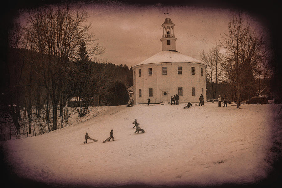 Sledding at the Vermont round church Photograph by Jeff Folger