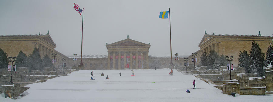 Sledding on the Steps of the Philadelphia Museum of Art Photograph by Bill Cannon