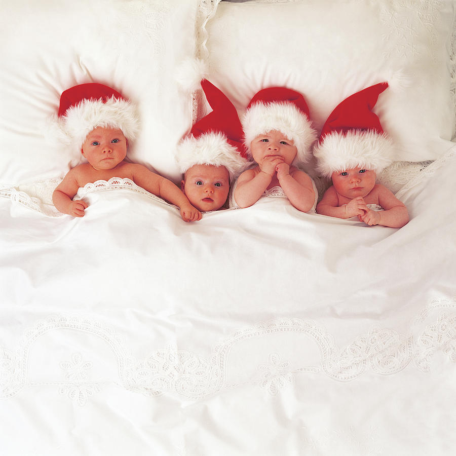 Christmas Photograph - Sleepy Santas by Anne Geddes