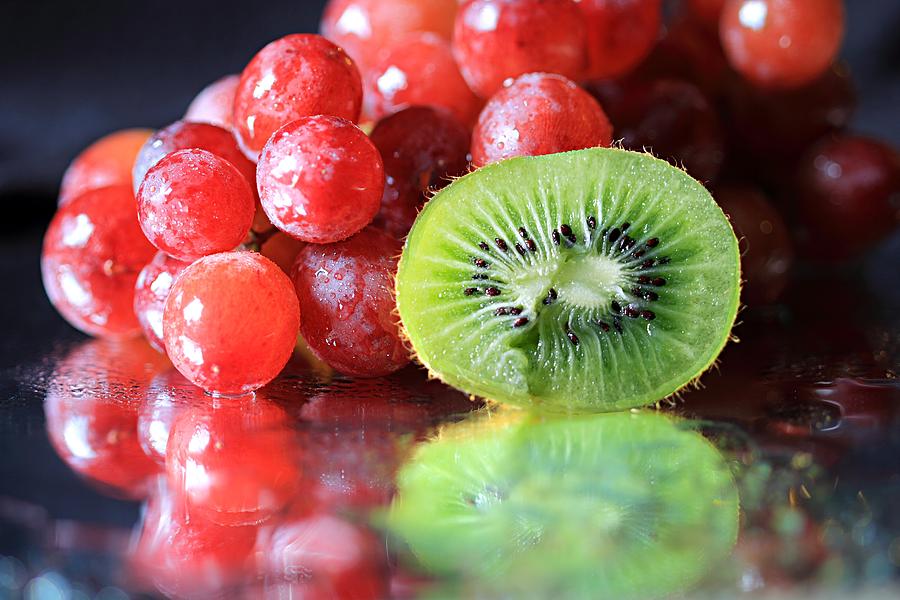 Sliced Kiwi and Grapes Photograph by Angela Murdock
