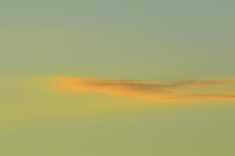 Small Cloud At Sunset  Photograph by Lyle Crump