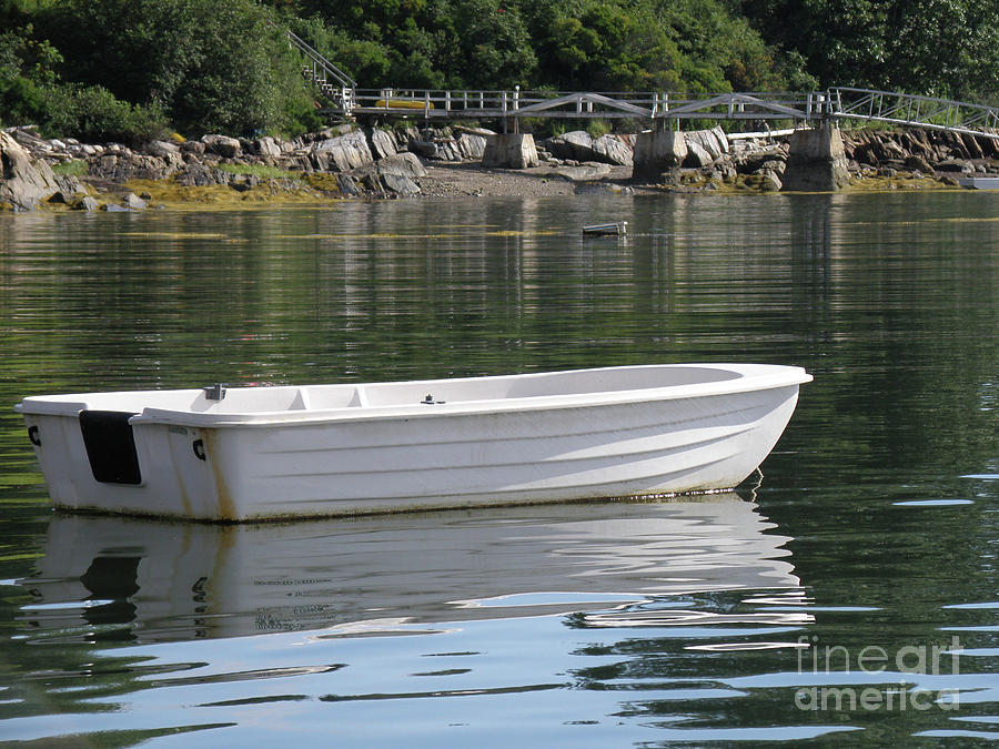 Small Dinghy in the Water on a Mooring in Casco Bay Photograph by DejaVu Designs