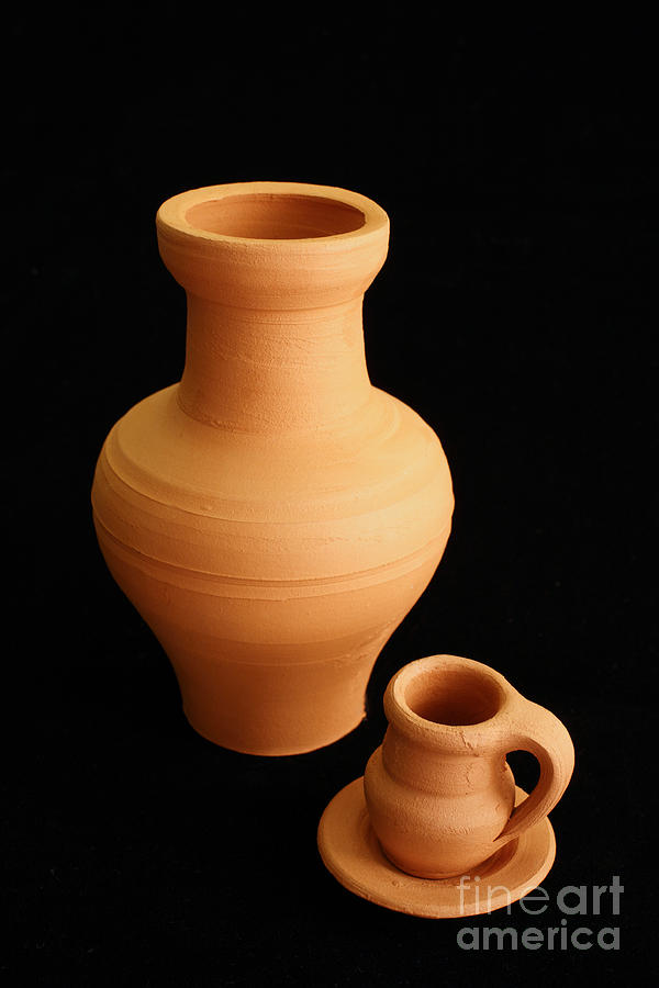 Small pottery items Photograph by Gaspar Avila