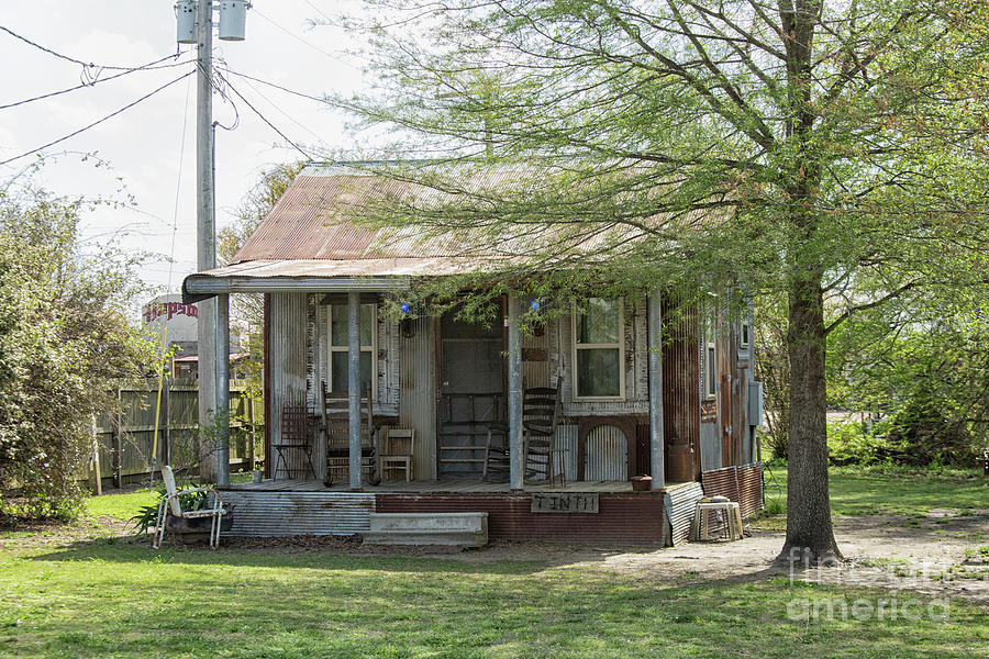 Small shack with porch in Clarksdale Photograph by Patricia Hofmeester