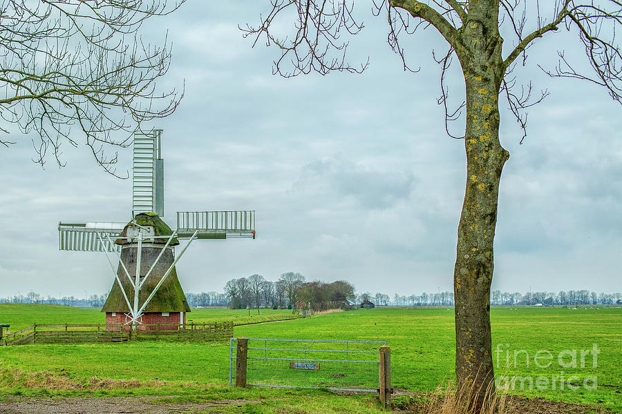 Small windmill Photograph by Patricia Hofmeester
