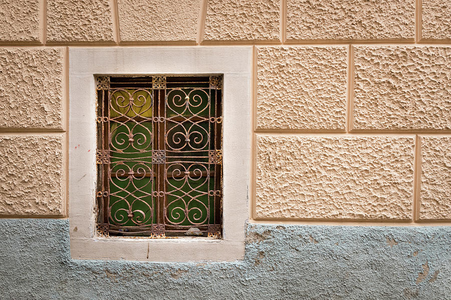 Small Window With Ornamented Grille In Croatia Photograph
