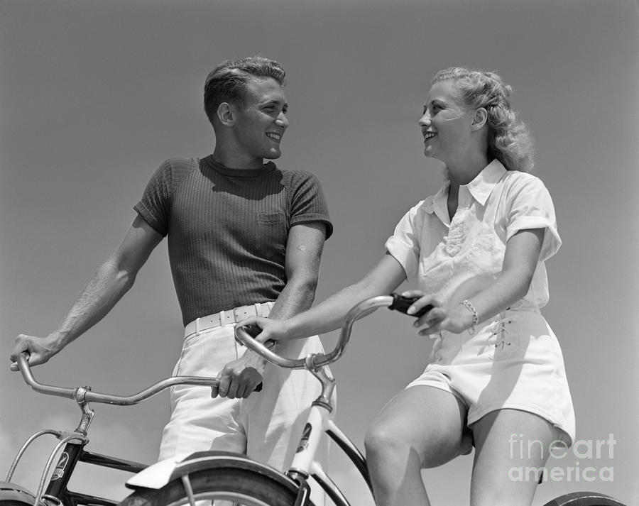 Smiling Couple On Bikes, C.1930-40s Photograph by H. Armstrong Roberts/ClassicStock
