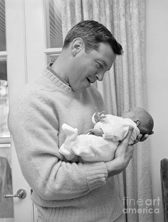 Smiling Father Holding Newborn, C.1960s Photograph by H. Armstrong Roberts/ClassicStock