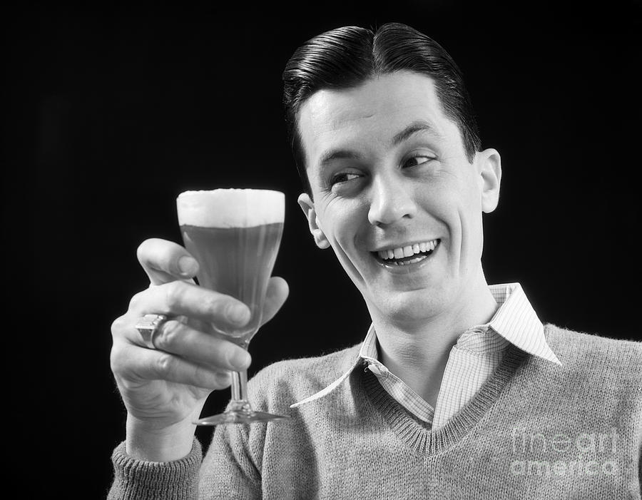Smiling Man Holding Glass Of Beer Photograph by H. Armstrong Roberts/ClassicStock