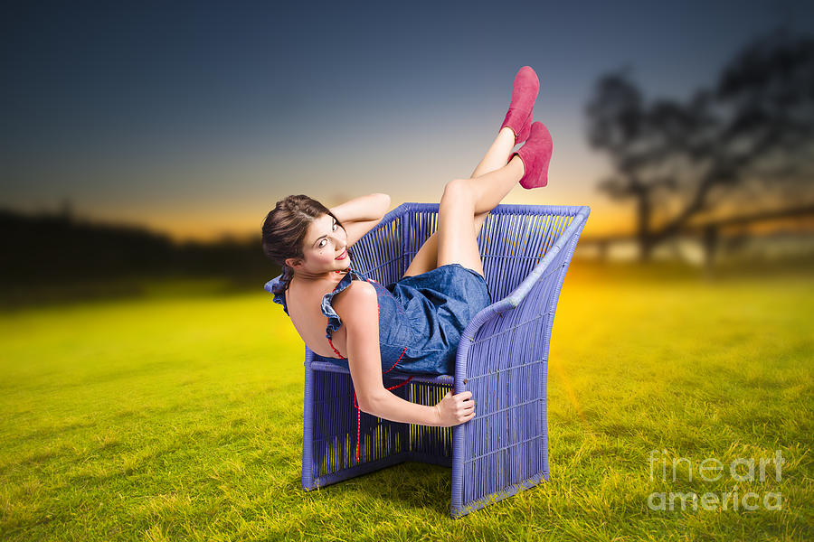 Smiling woman relaxing outdoors looking happy  Photograph by Jorgo Photography