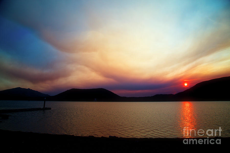 Smokey sunset over East Lake Photograph by Bruce Block