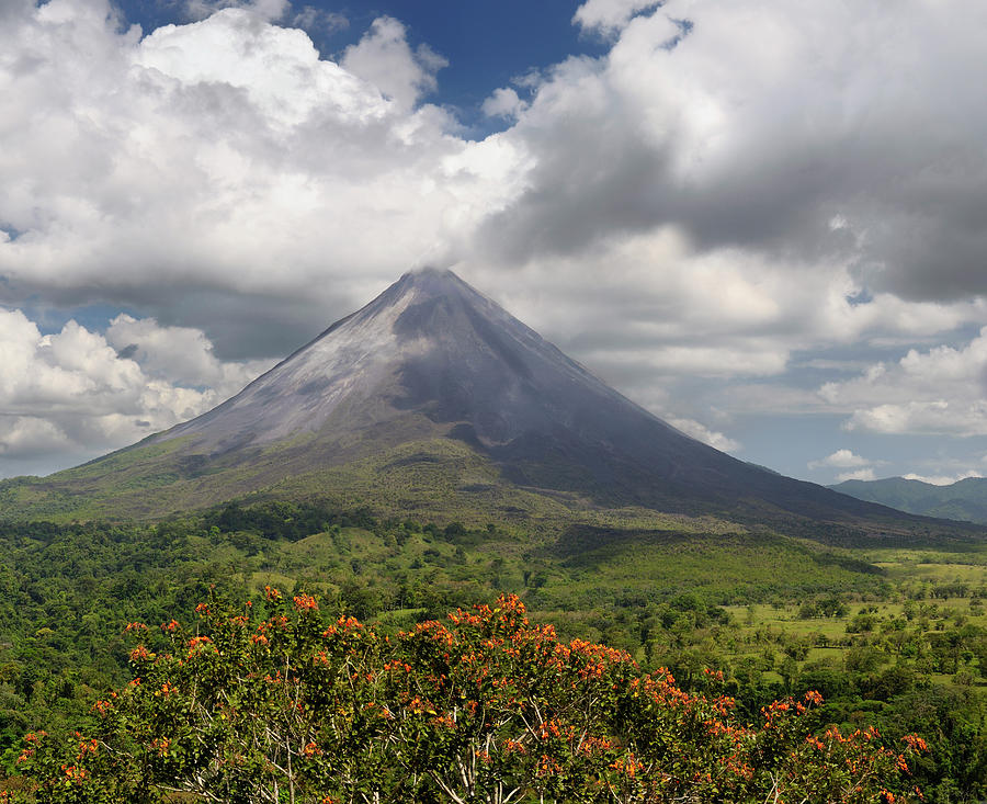 Smoking Arenal Volcano on San Carlos Plains in Costa Rica with o ...