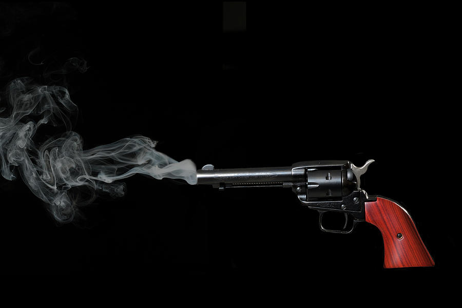 Smoking gun Photograph by Dan Friend