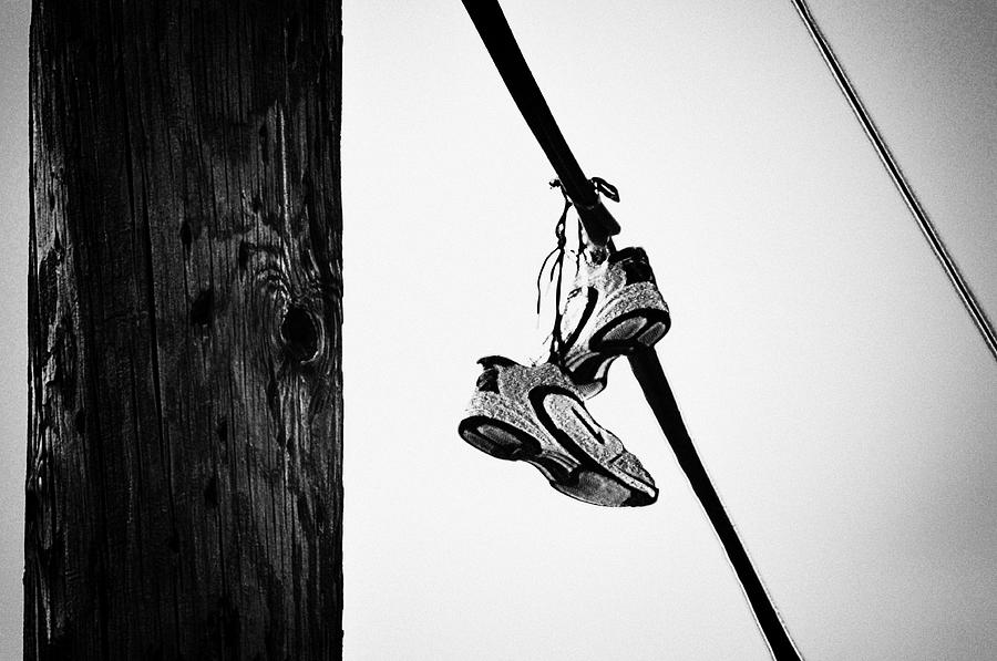 Sneakers on Power Line Photograph by 
