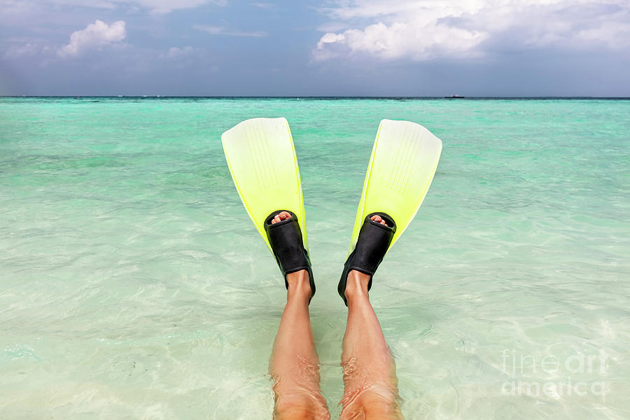 Snorkeling In The Ocean. Fins On Legs In Clear Water, Maldives. Photograph