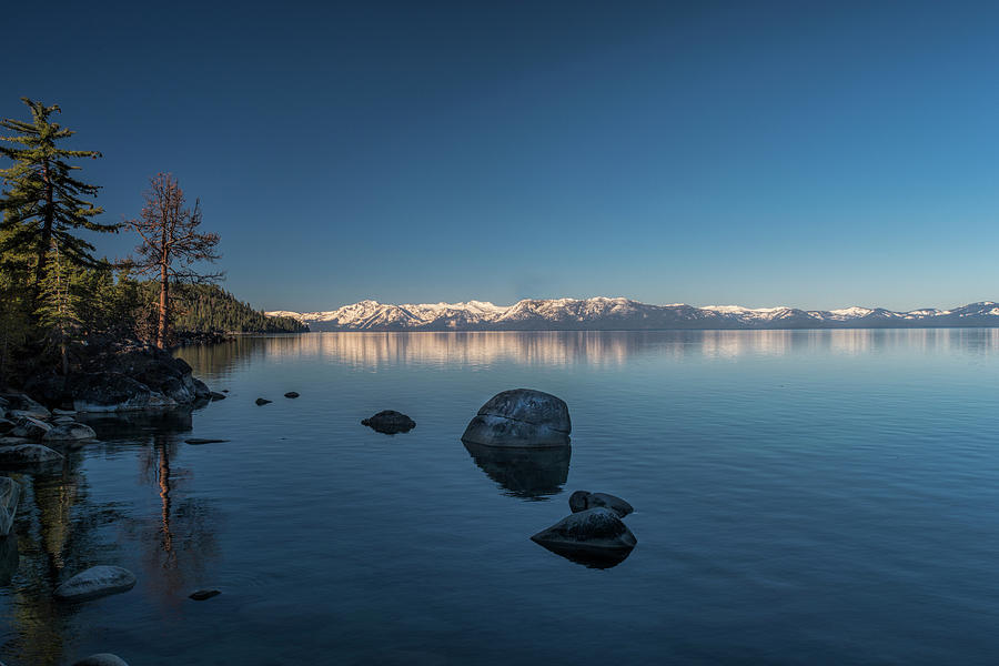 Snow covered mountains at Lake Tahoe Photograph by Dan Friend