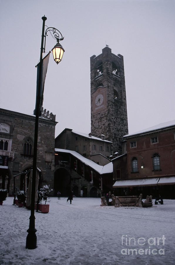 Snow in Piazza Vecchia Photograph by Riccardo Mottola
