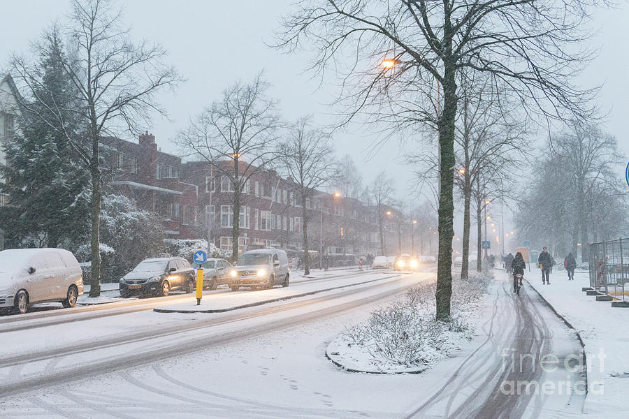 Snow in town Photograph by Patricia Hofmeester